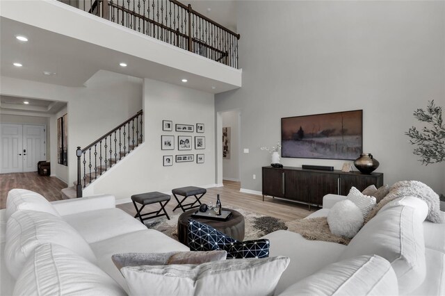 4360 Sunset Preserve Blvd, Orlando, FL 32820 - living room with a towering ceiling and hardwood / wood-style flooring