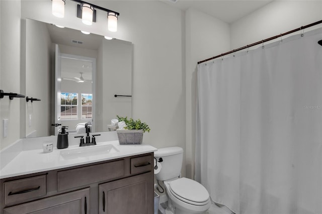4360 Sunset Preserve Blvd, Orlando, FL 32820 - bathroom with ceiling fan, toilet, and vanity