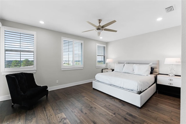 bedroom featuring ceiling fan and dark hardwood / wood-style floors