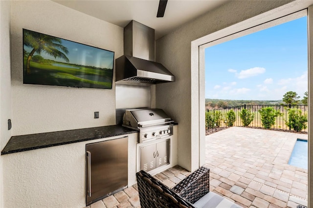 view of patio / terrace featuring area for grilling, a grill, and ceiling fan