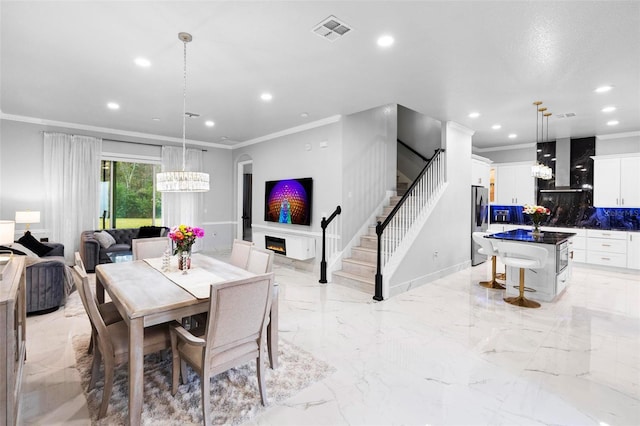 dining space with ornamental molding