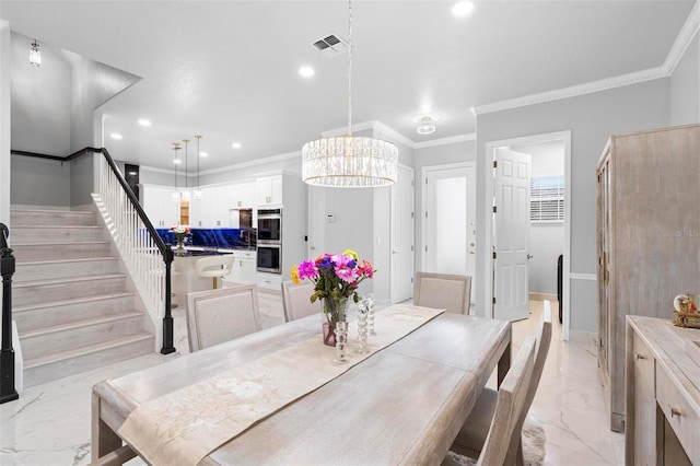 dining space with a chandelier and ornamental molding