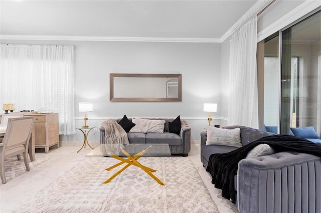 living room featuring a healthy amount of sunlight and ornamental molding