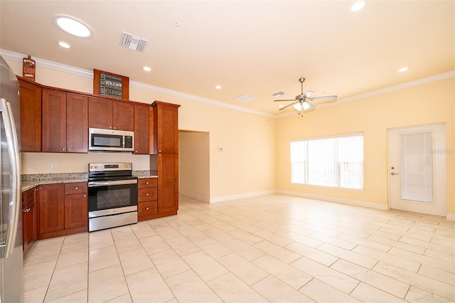 kitchen with light stone countertops, ceiling fan, stainless steel appliances, and ornamental molding