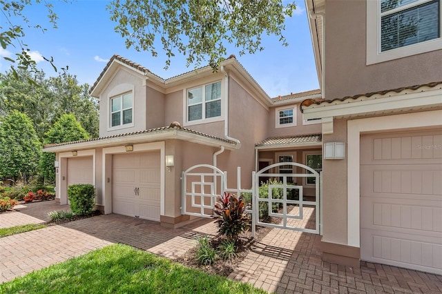 view of front of home with a garage