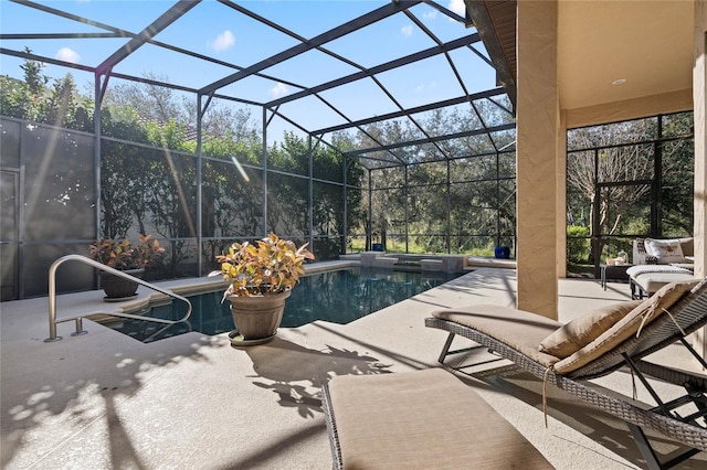 view of pool featuring a patio area and a lanai