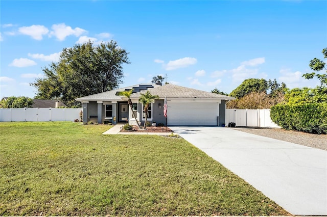 single story home featuring a front lawn, a garage, and solar panels