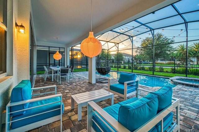 view of patio with outdoor lounge area, a swimming pool with hot tub, and glass enclosure