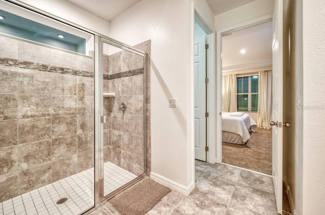 bathroom featuring a shower with door