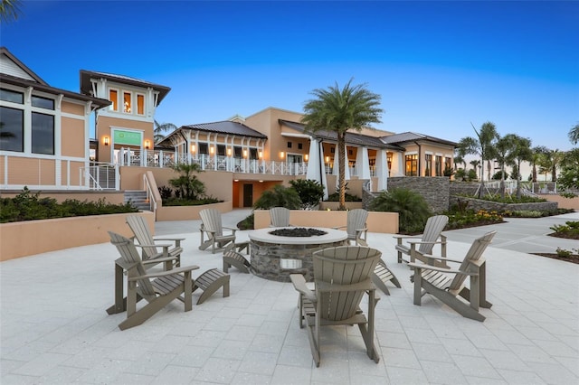 view of patio / terrace with a fire pit