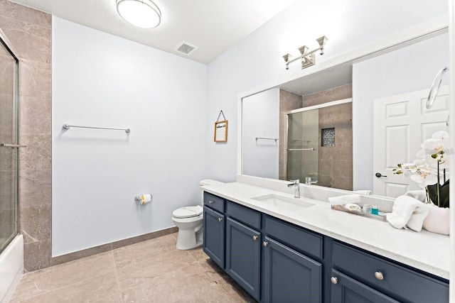 full bathroom with vanity, toilet, and combined bath / shower with glass door