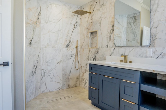 bathroom with a shower, crown molding, vanity, and tile walls