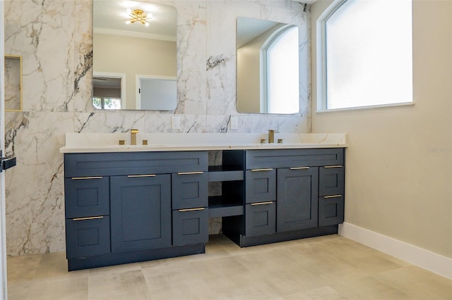 bathroom featuring vanity and crown molding