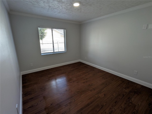 unfurnished room with dark hardwood / wood-style flooring, a textured ceiling, and ornamental molding