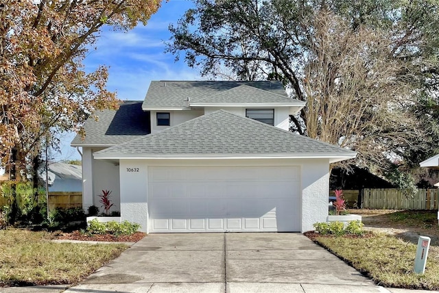 front of property with a garage