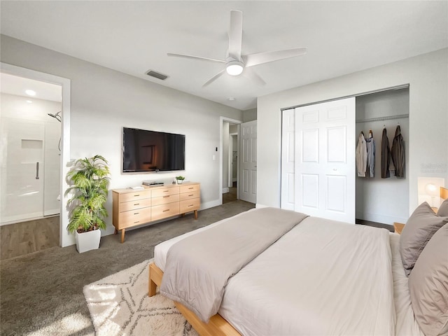 carpeted bedroom with ceiling fan and a closet