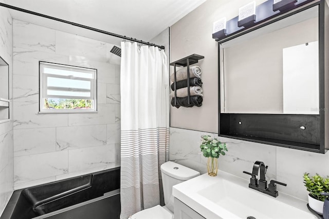 full bathroom with tasteful backsplash, tile walls, toilet, vanity, and shower / tub combo