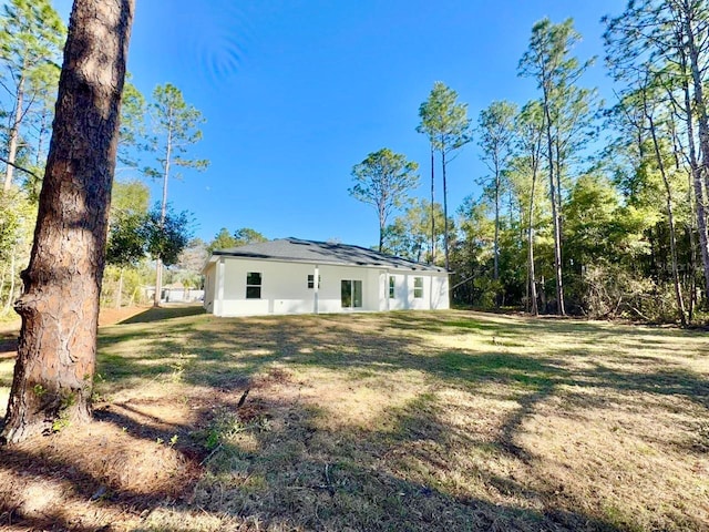 exterior space with a lawn