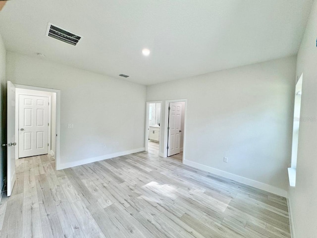 unfurnished bedroom with light hardwood / wood-style flooring