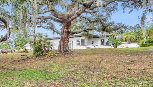 exterior space featuring a front lawn