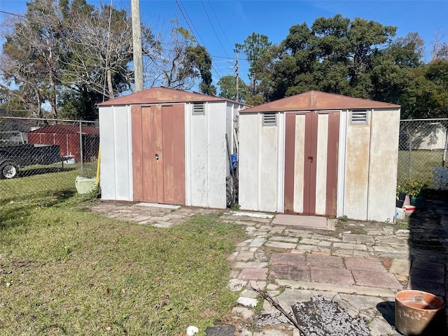 view of outdoor structure with a yard