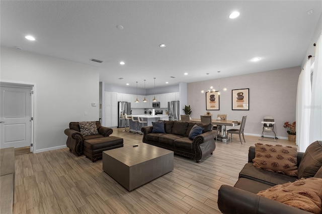 living room with a chandelier