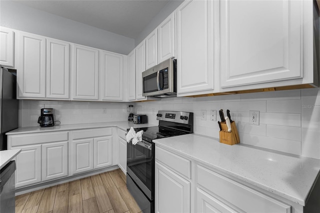 kitchen with white cabinets and stainless steel appliances