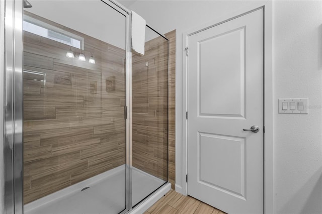 bathroom with an enclosed shower