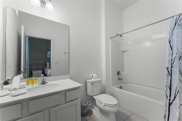 full bathroom with toilet, shower / bath combo, vanity, and tile patterned floors