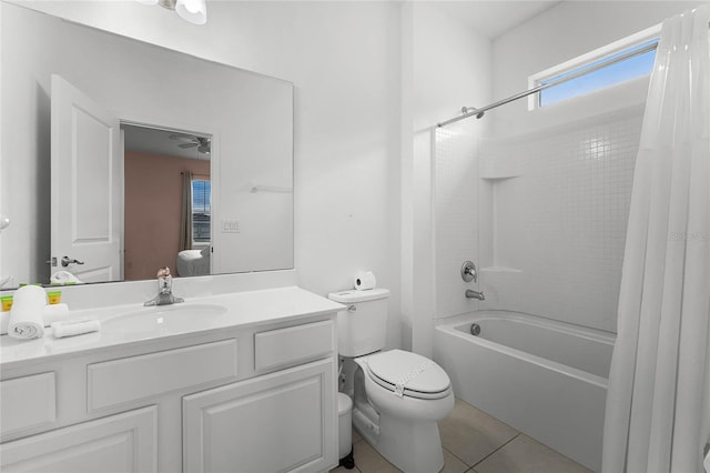 full bathroom with tile patterned floors, shower / tub combo with curtain, vanity, and toilet