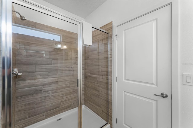 bathroom with an enclosed shower