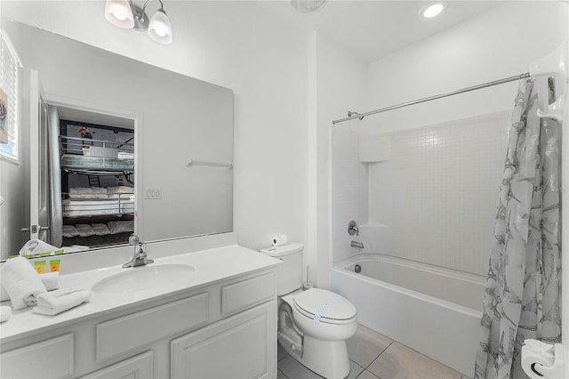 full bathroom with tile patterned flooring, shower / bath combination with curtain, toilet, and vanity