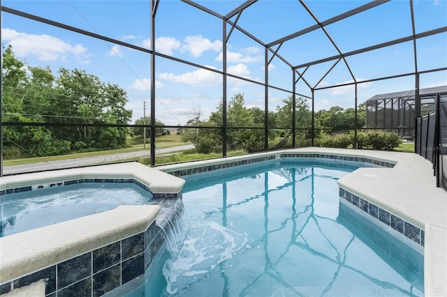 view of swimming pool featuring a lanai