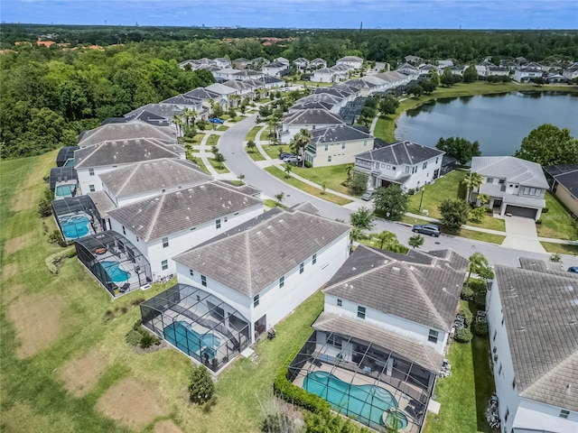 drone / aerial view with a water view