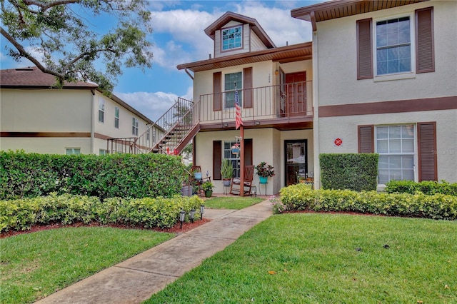 view of front of home with a front yard