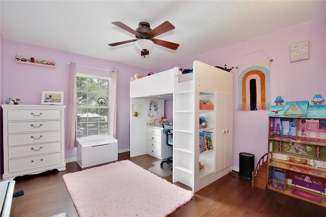 bedroom featuring ceiling fan and dark wood-type flooring