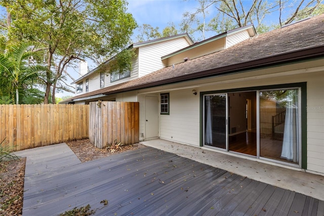 wooden deck featuring fence