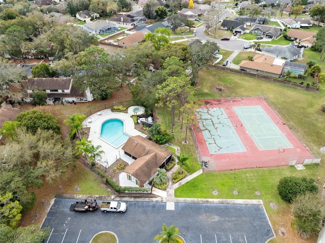 birds eye view of property with a residential view