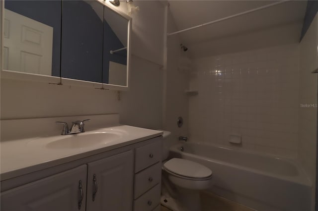 full bathroom with vanity, toilet, and tiled shower / bath