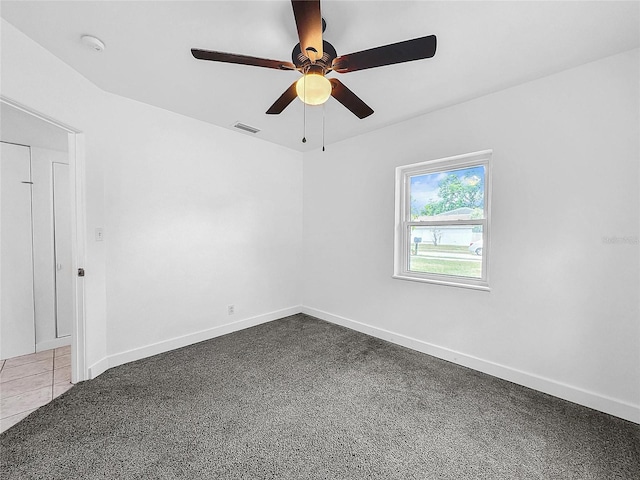 spare room featuring ceiling fan