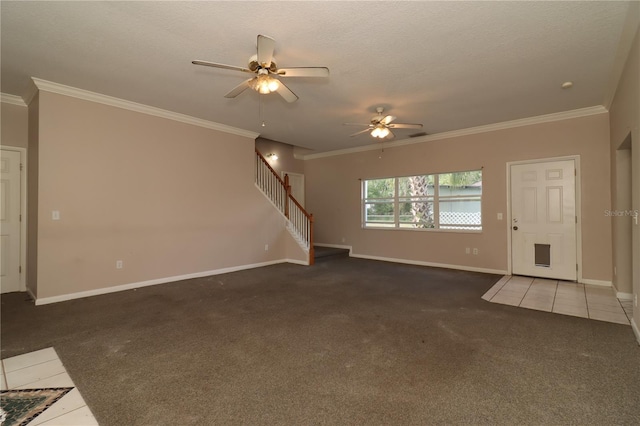 unfurnished living room featuring crown molding, dark carpet, and a textured ceiling