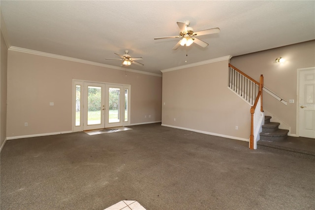 unfurnished living room with dark carpet, ornamental molding, french doors, and ceiling fan