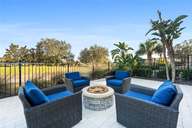 view of patio featuring an outdoor fire pit