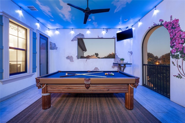 game room with ceiling fan and billiards