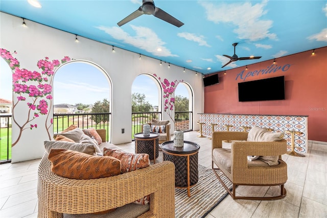 view of patio featuring ceiling fan and an outdoor hangout area