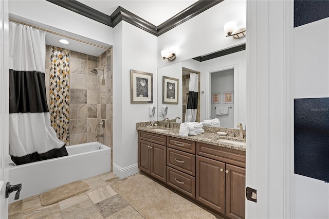 bathroom with vanity, ornamental molding, and shower / tub combo with curtain