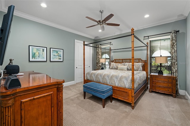 bedroom with ceiling fan, light colored carpet, and ornamental molding