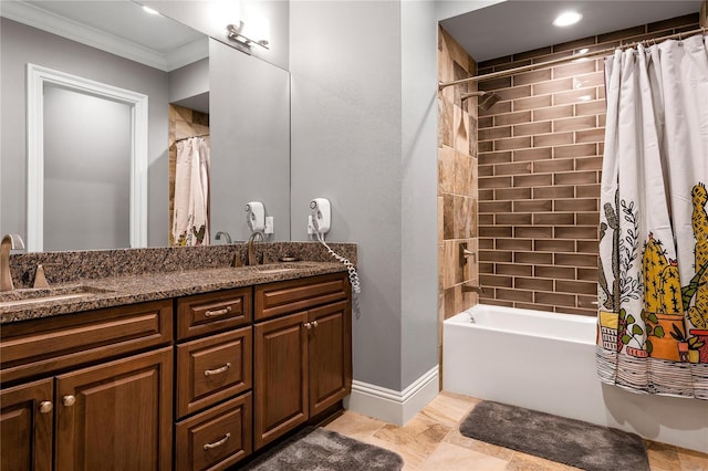 bathroom with vanity, shower / bath combo with shower curtain, and crown molding