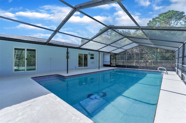 view of pool featuring a patio and a lanai