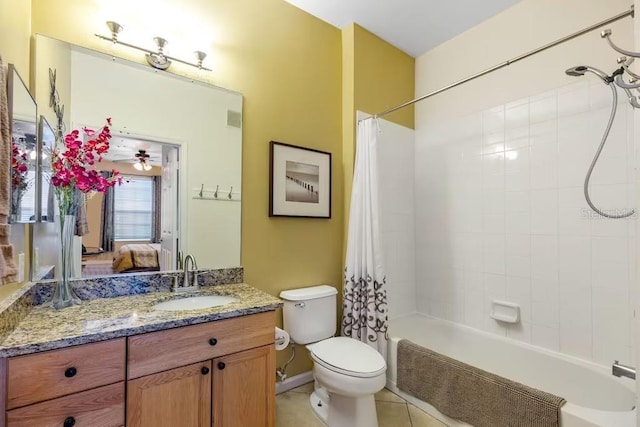 full bathroom with ceiling fan, shower / bath combo, tile patterned floors, toilet, and vanity